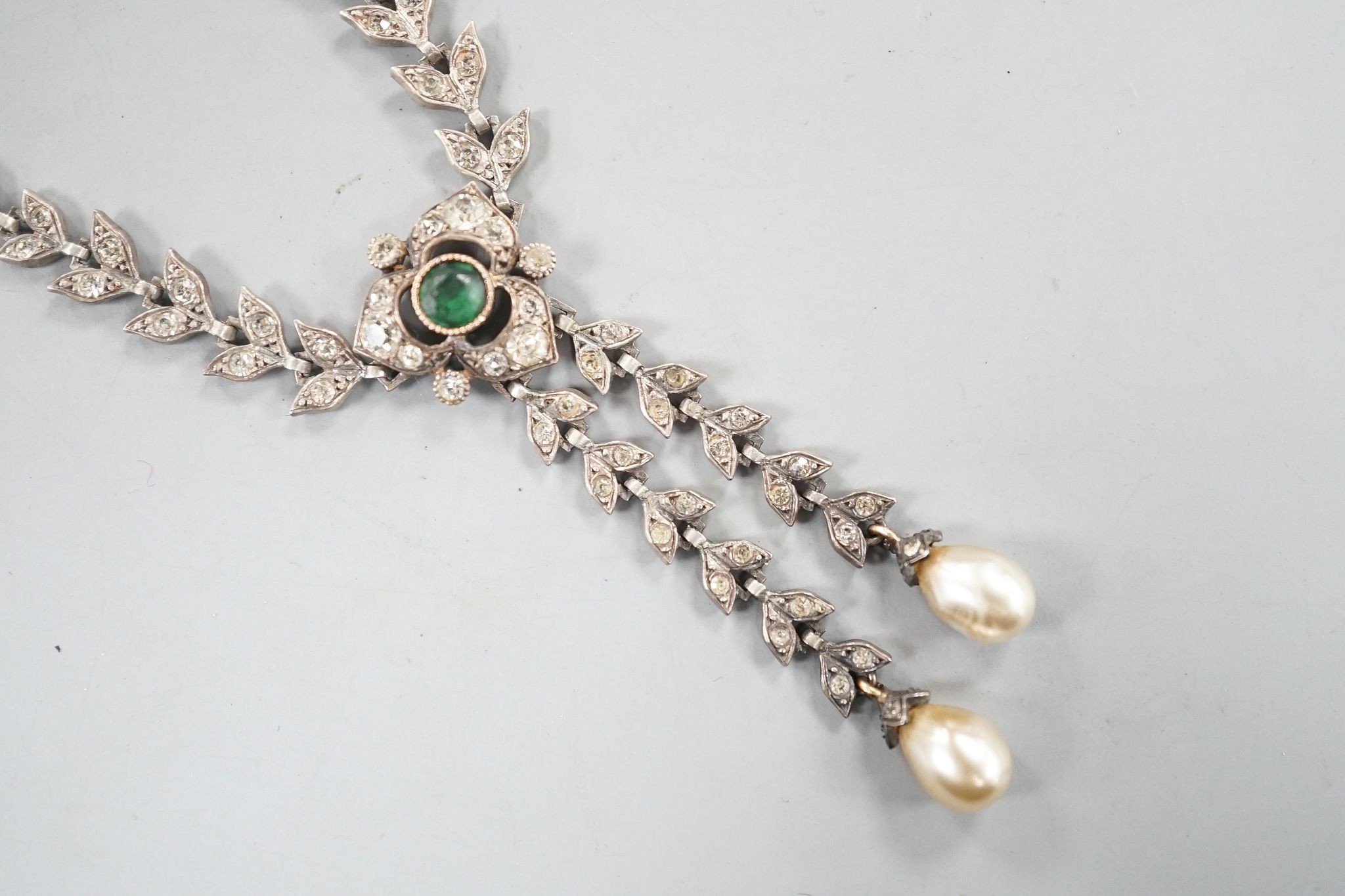 An antique white metal, two colour paste and simulated pearl set drop pendant necklace, 47cm.